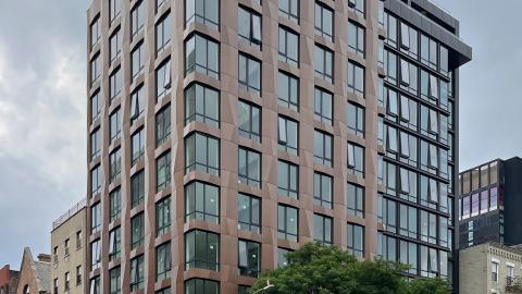 Finishing touches and sidewalk work at 125 Chrystie 